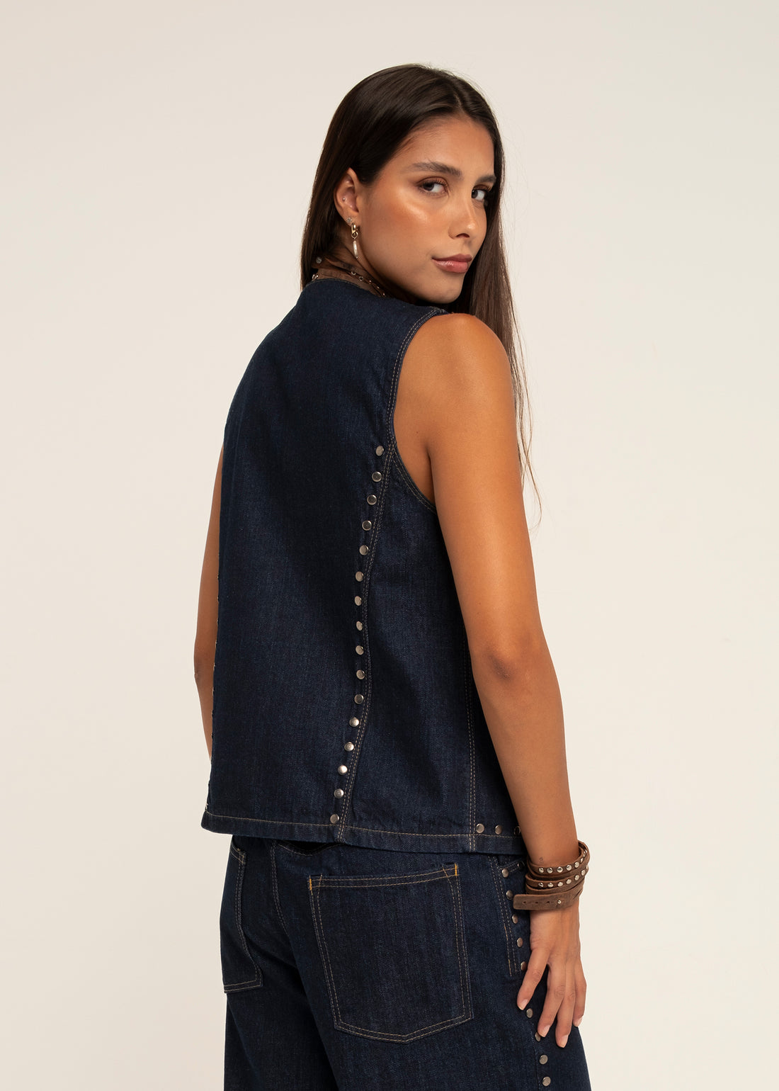 STUDDED ASYMMETRICAL DARK DENIM VEST